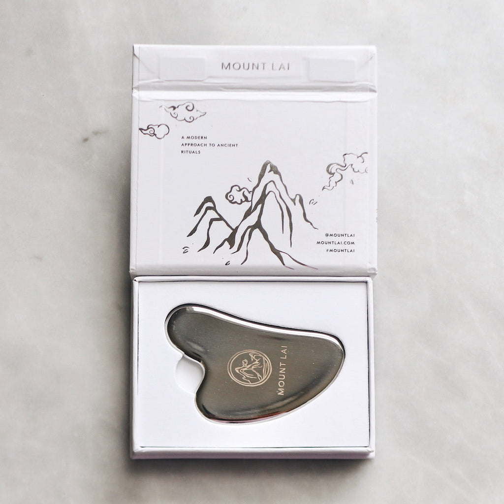 L'outil de lifting facial Gua Sha en acier inoxydable