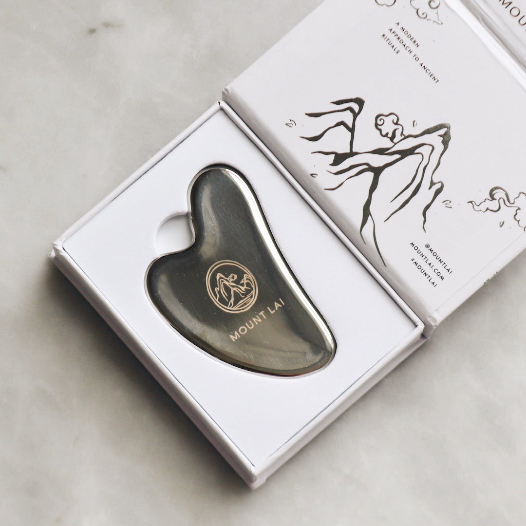 L'outil de lifting facial Gua Sha en acier inoxydable