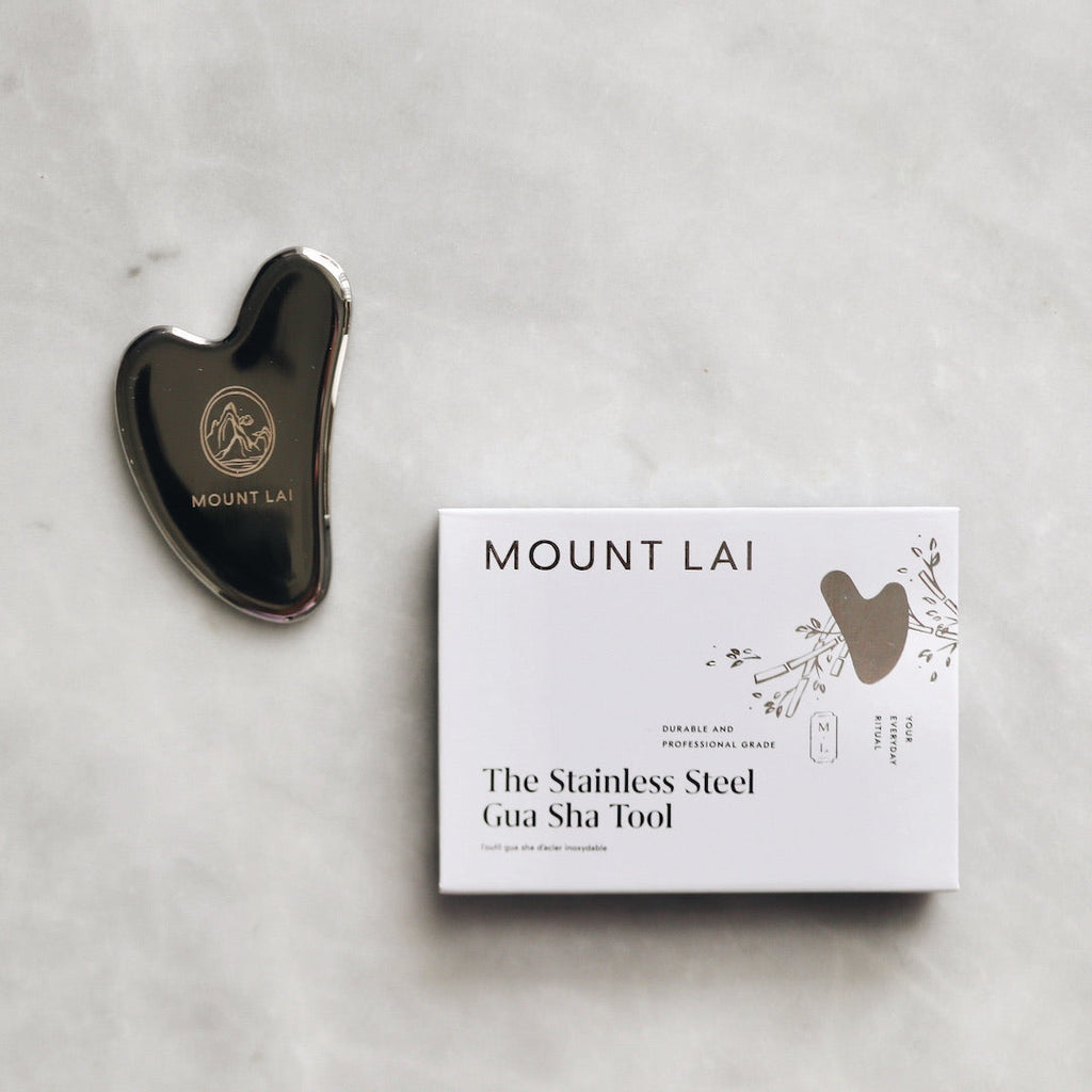 L'outil de lifting facial Gua Sha en acier inoxydable