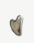 L'outil de lifting facial Gua Sha en acier inoxydable